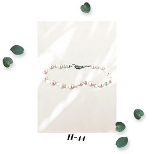 Pink Glass Pearl & White Cat's Eye Knotted Bracelet